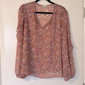 Sheer long sleeved floral top